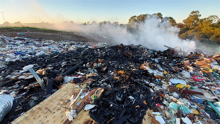 Battery fire in waste