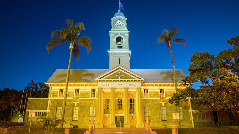 Maryborough City Hall lit yellow/gold