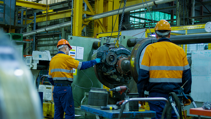 People working on machinery