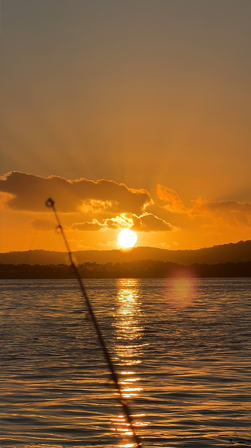 Photo taken by Beth Welsh, titled K'gari at First Light. Views over the water at daybreak.