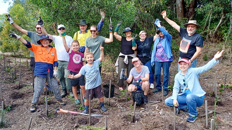 Group of people attending a Community Tree Planting