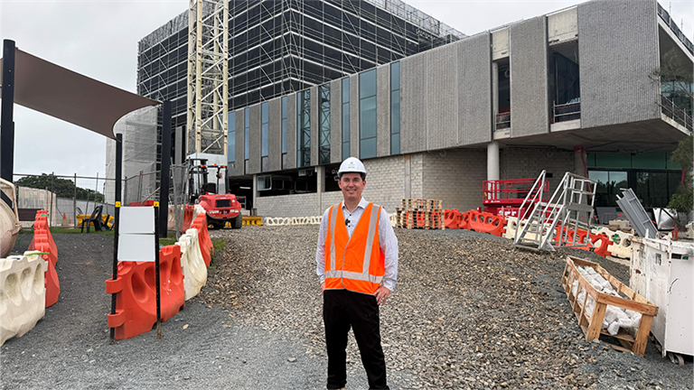 Mayor George Seymour standing in front of the Hervey Bay Community Hub