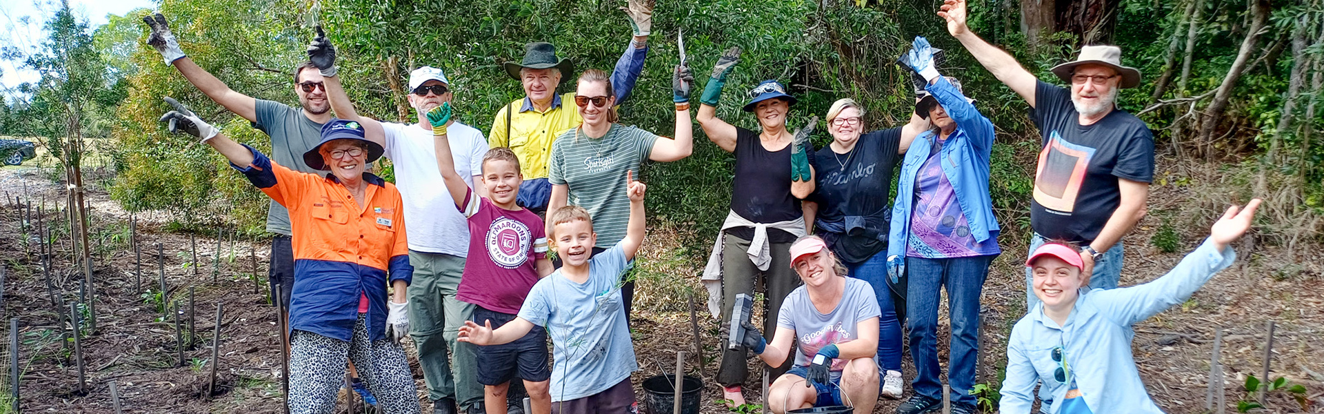 Group of residents participating in a Community Tree Planting event
