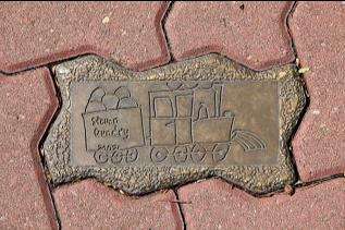 Brass plaque on Ellena Street