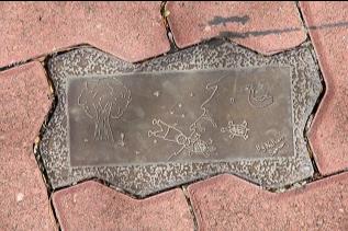 Brass plaque on Ellena Street