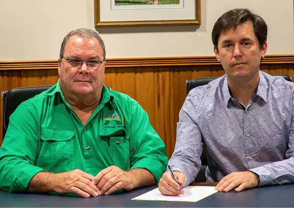 Fraser coast citizen of the year bob wicks is first to sign queen s condolence book with mayor george seymour media release 600x424