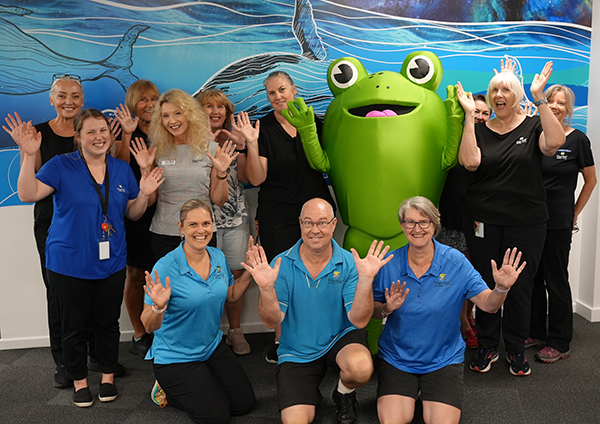 Staff at the Hervey Bay Library celebrate their reopening following refurbishments.